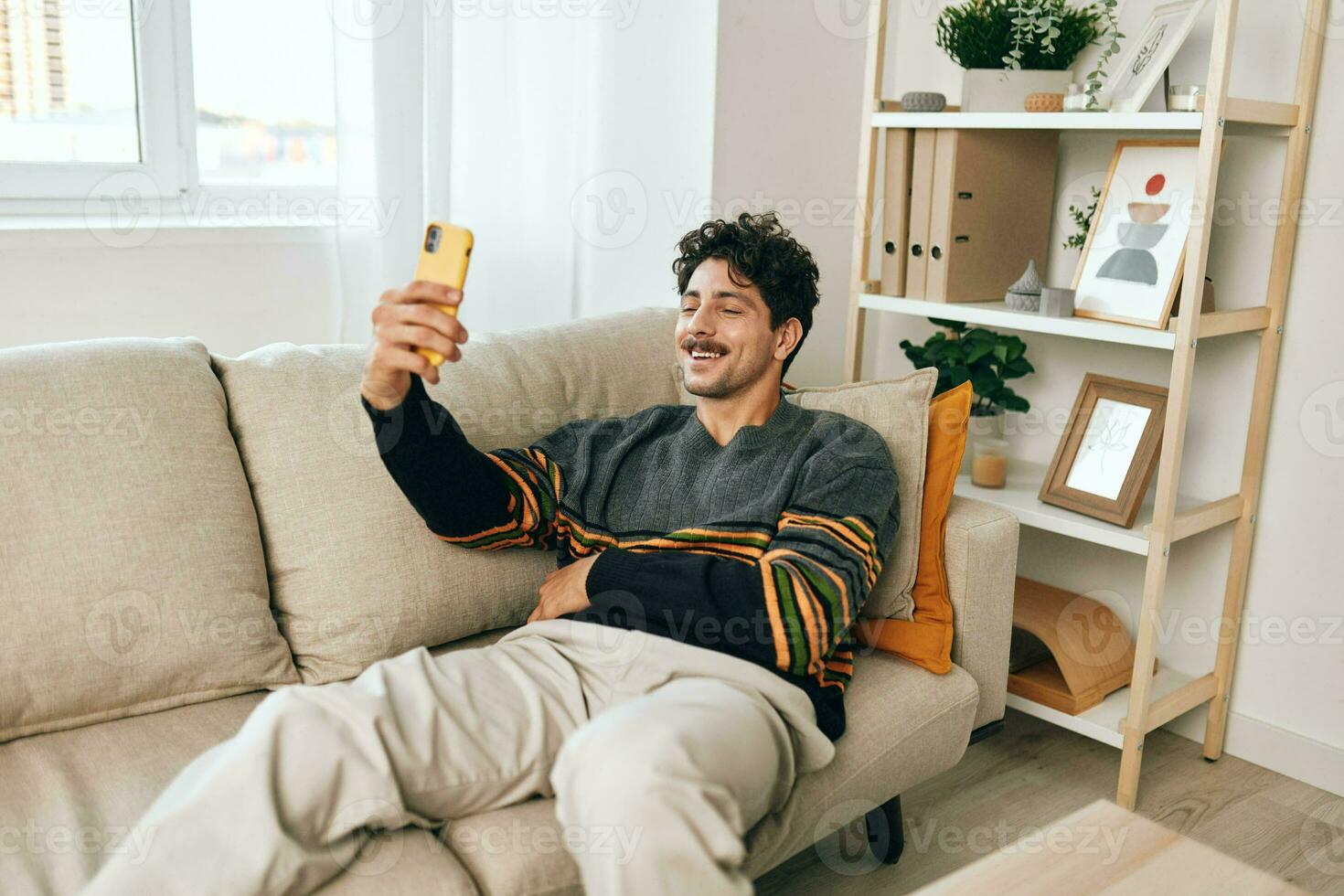 Communication man selfie typing mobile sofa lifestyle phone message home technology photo