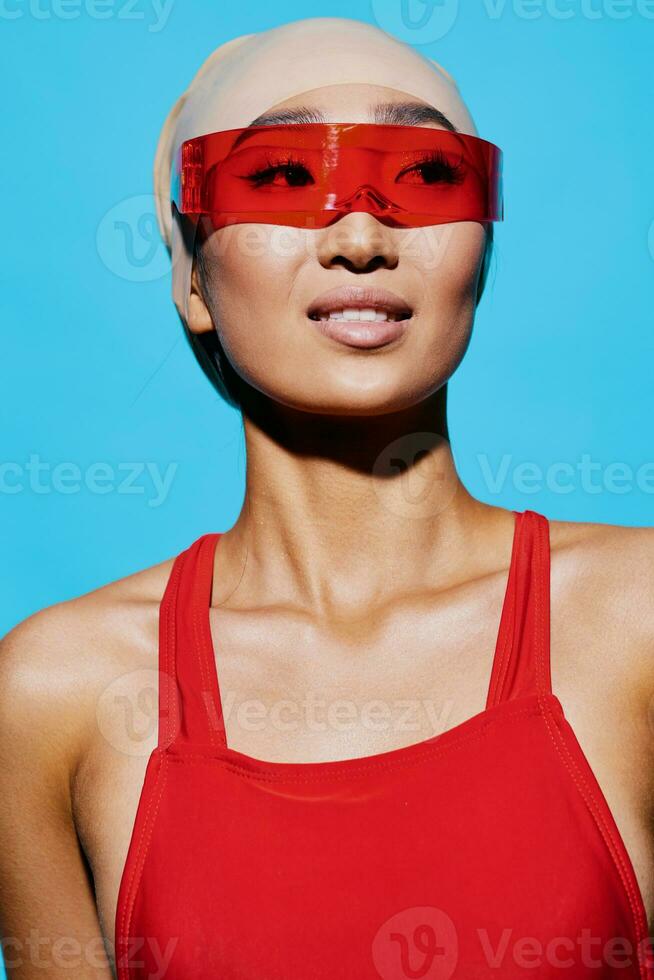 Smiling woman beauty red blue sunglasses photo