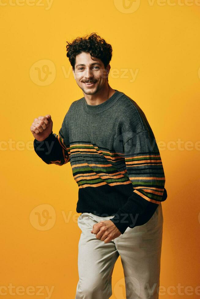 Man orange background smile portrait sweater fashion student happy guy cheerful trendy natural photo