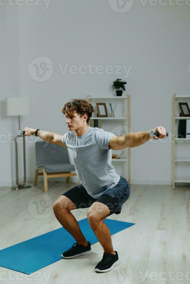 health man sport activity home gray lifestyle indoor training dumbbells gym photo