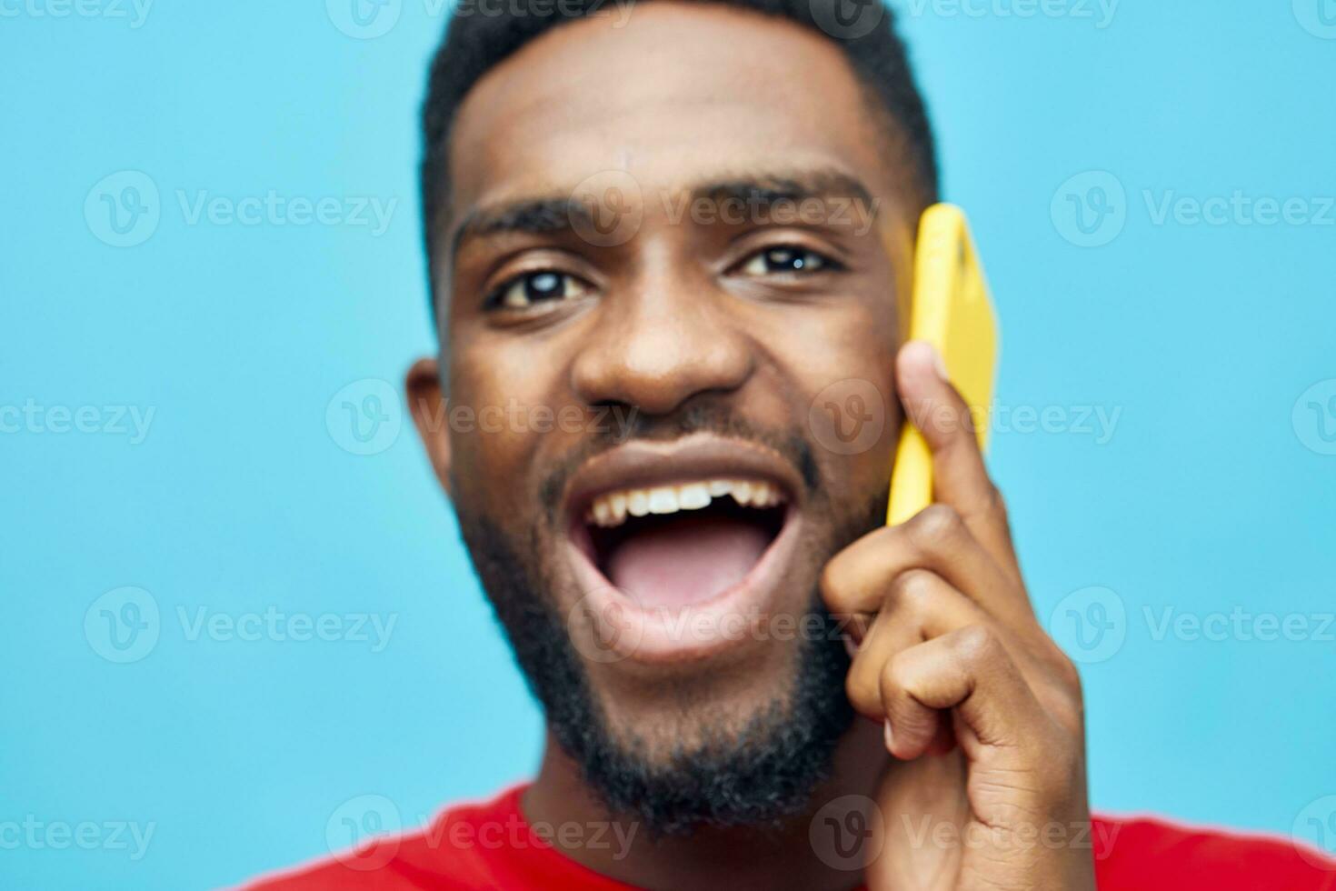 smile man studio app technology phone mobile background black african happy young photo