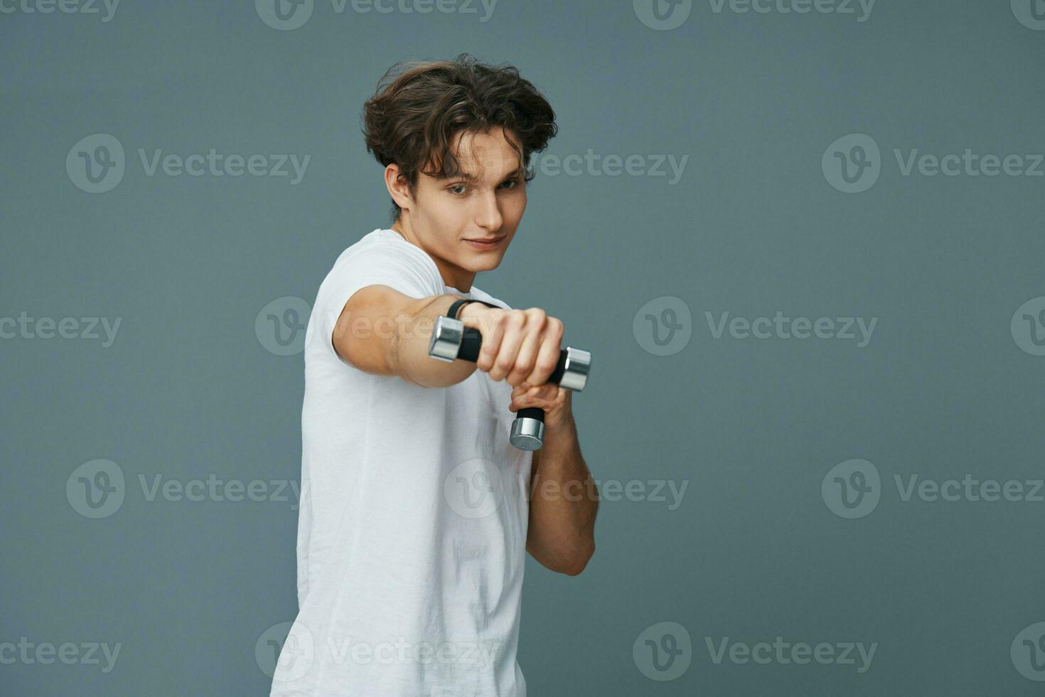 fitness man dumbbell training fit athlete young sport lifestyle holding exercise photo