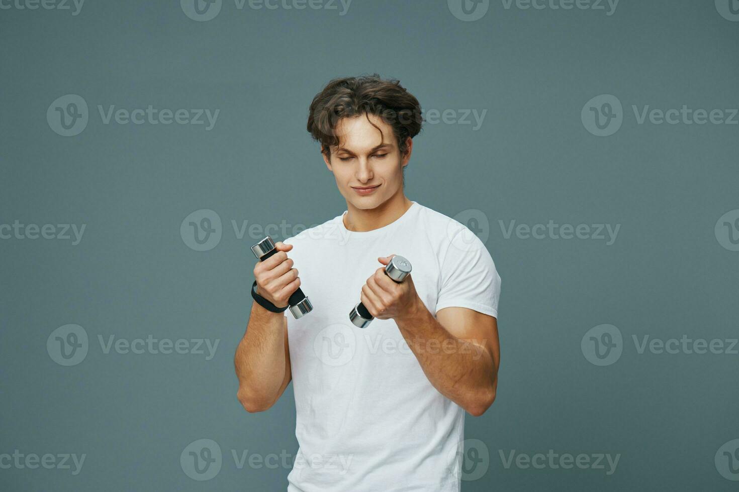 man sport young dumbbell lifestyle fit training holding fitness gym exercise photo