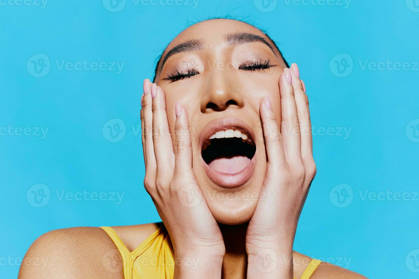 Beauty woman smile yellow lifestyle surprised portrait blue fashion makeup trendy photo