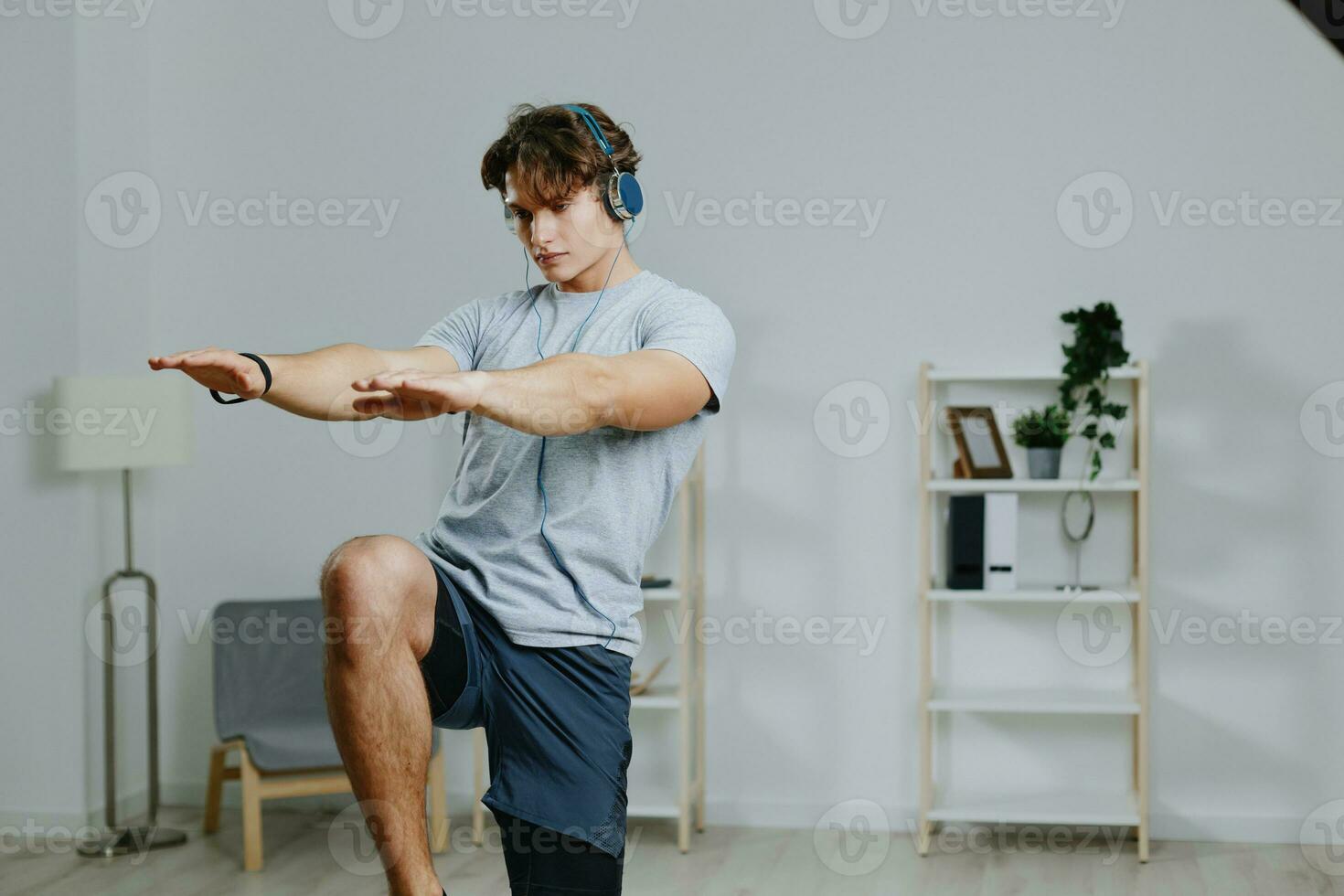 man lifestyle sport gray home activity healthy indoor training headphone sportswear photo