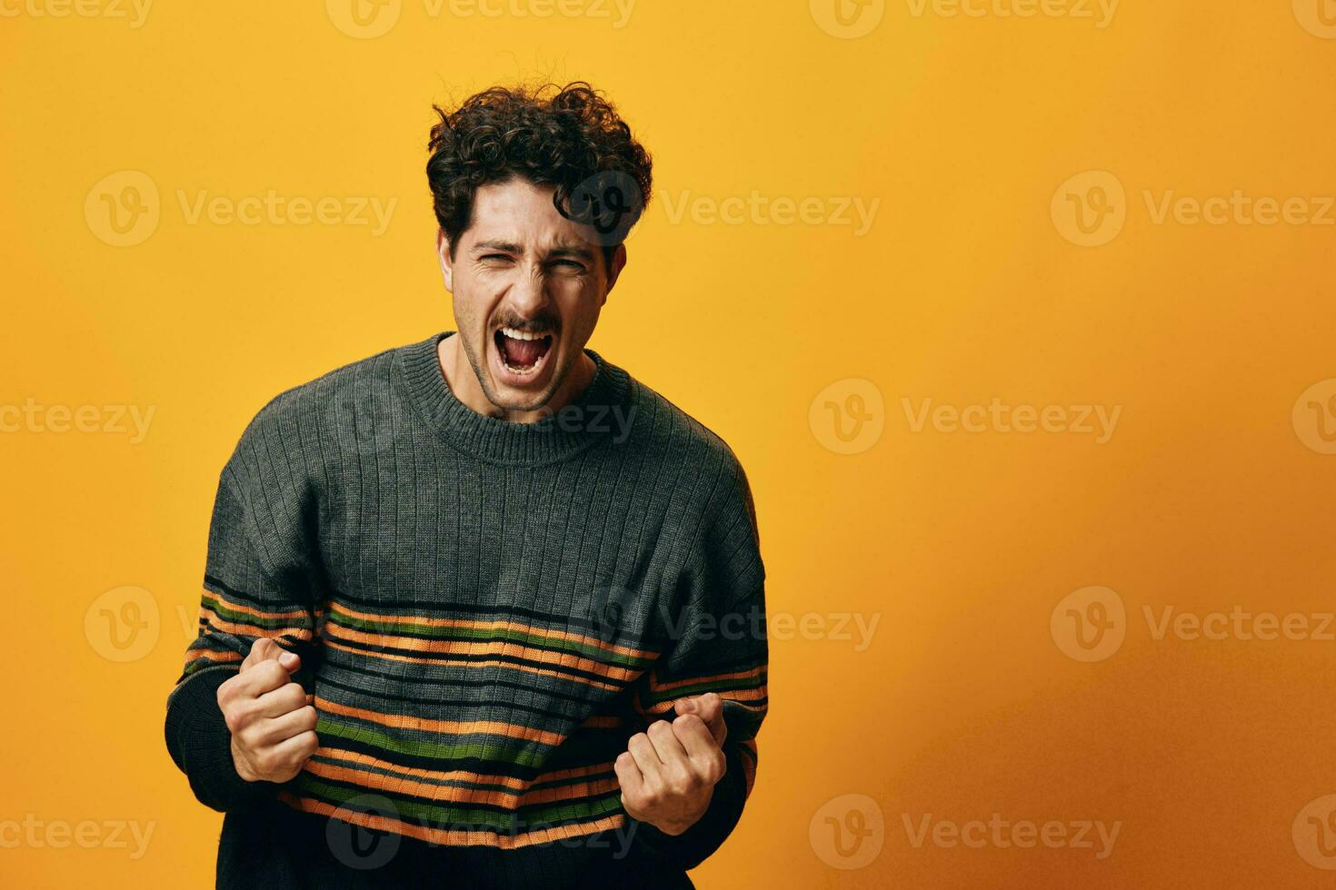 Man happy background orange student sweater portrait smile young gesture trendy fashion photo