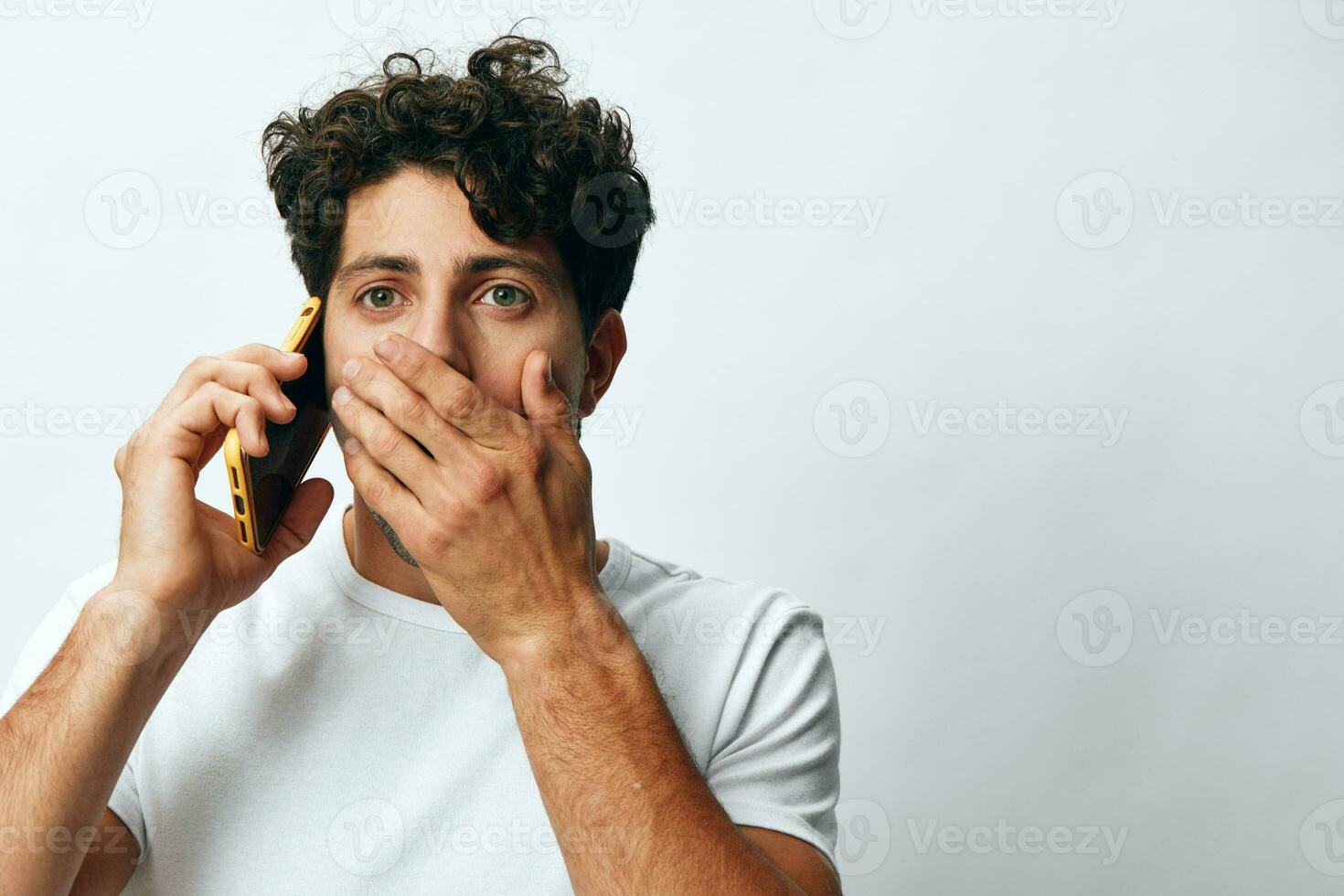 Portrait man online lifestyle connection message phone white smartphone casual t-shirt technology caucasian hipster photo