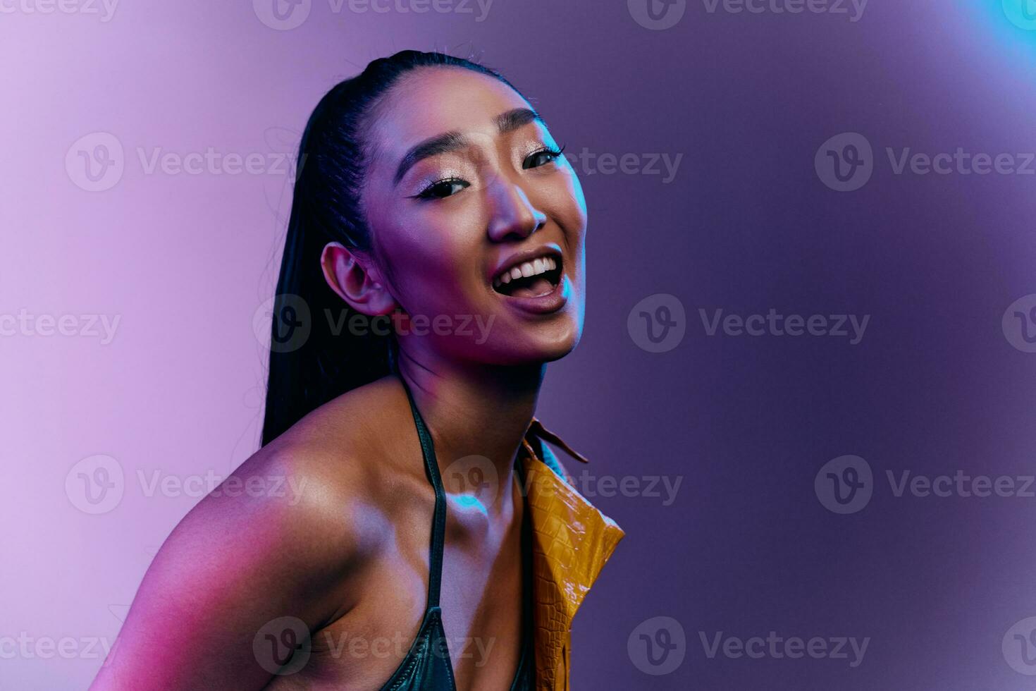 Trendy woman elegant light colorful disco blue beauty fashion neon purple photo
