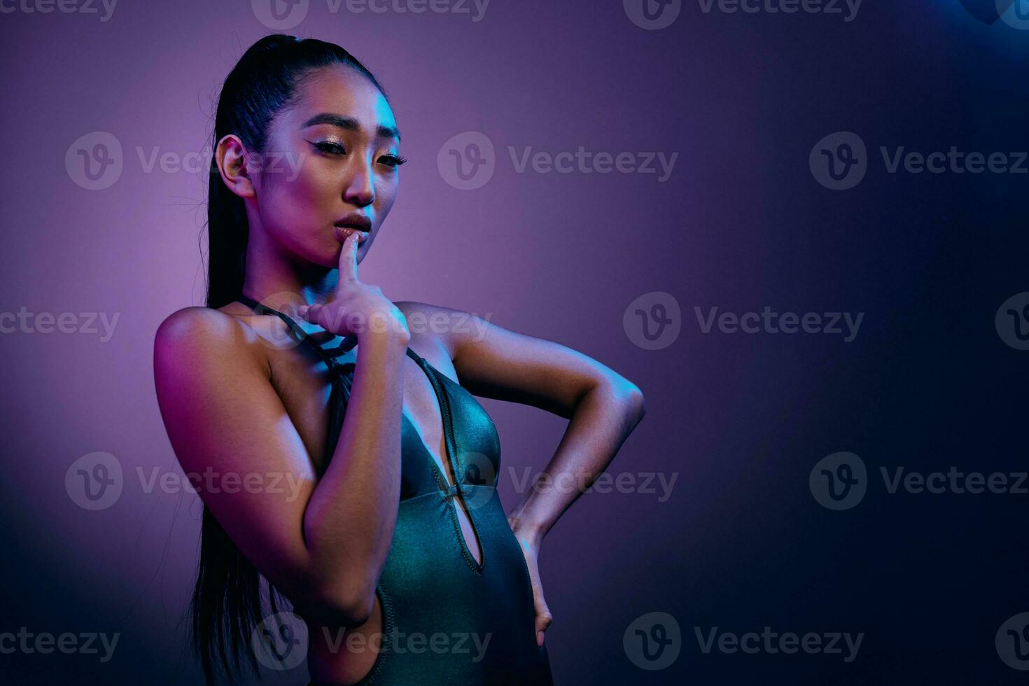 Trendy woman light colorful lips purple beauty neon luxury blue disco fashion photo