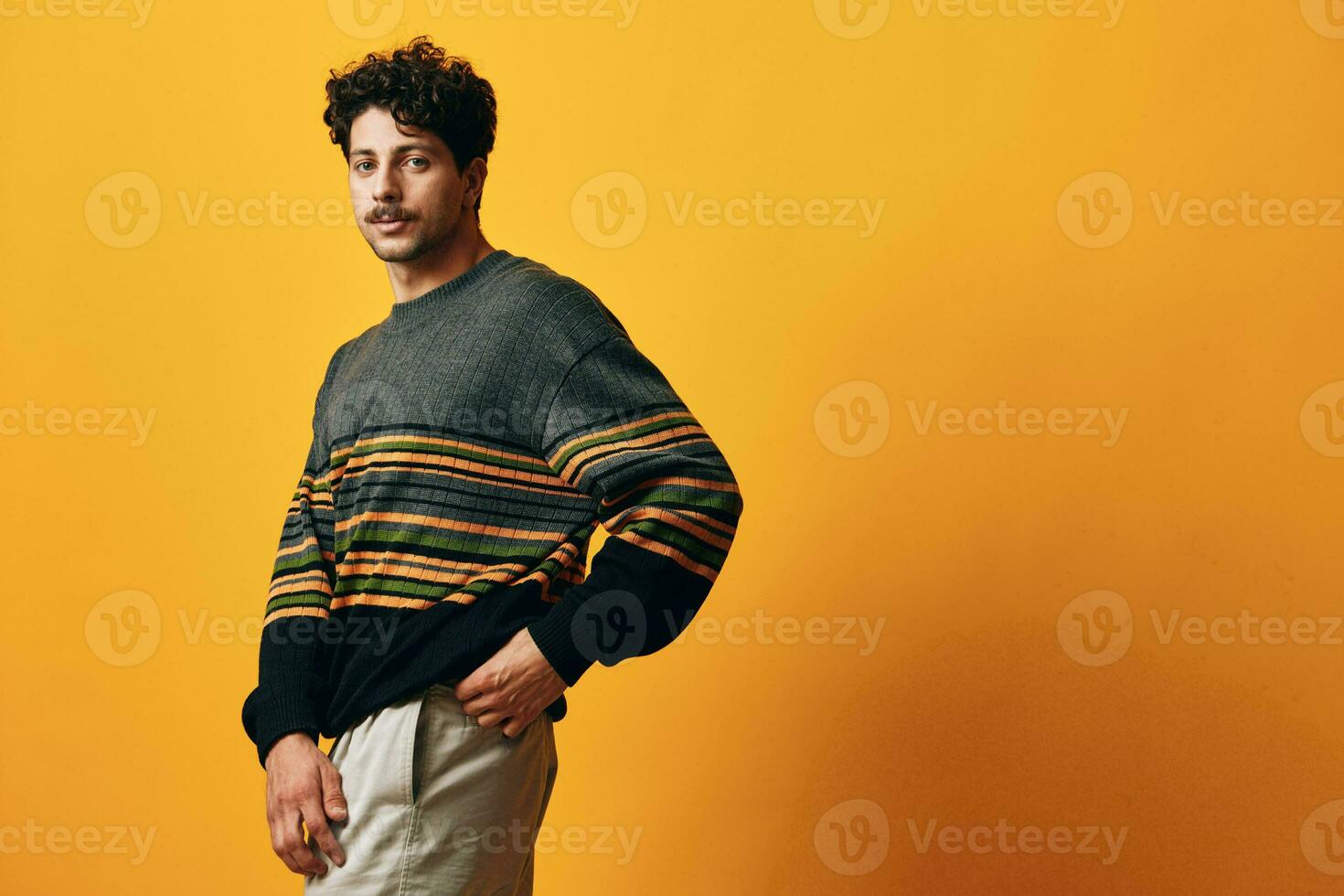 Man sweater orange background smile caucasian expression portrait face style happy fashion trendy student photo