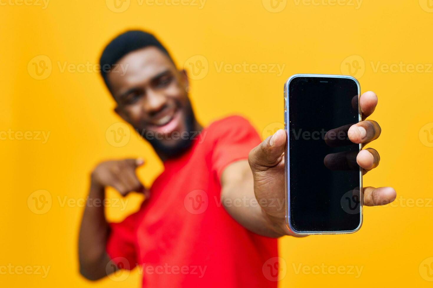 young man technology background black mobile guy yellow phone african colorful happy photo