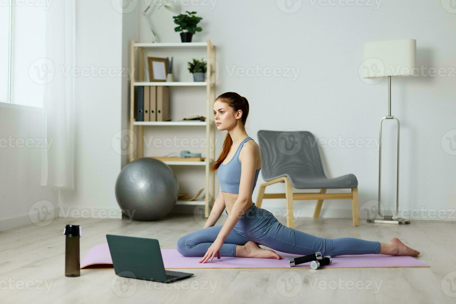 home woman training lifestyle health video relaxation yoga laptop mat lotus photo