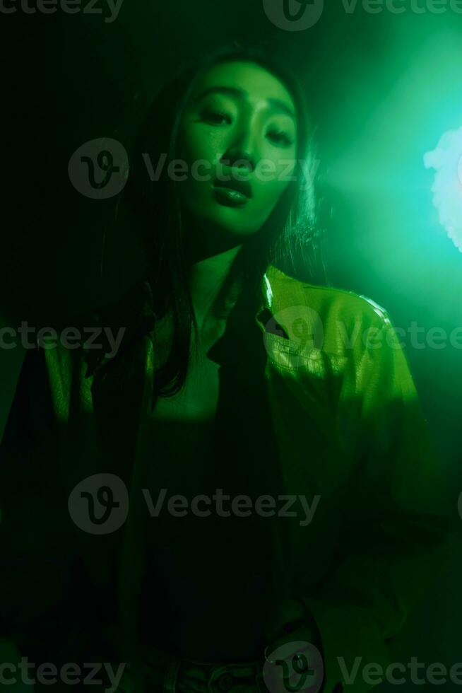 Woman beauty colourful portrait smoke concept green neon art light trendy photo