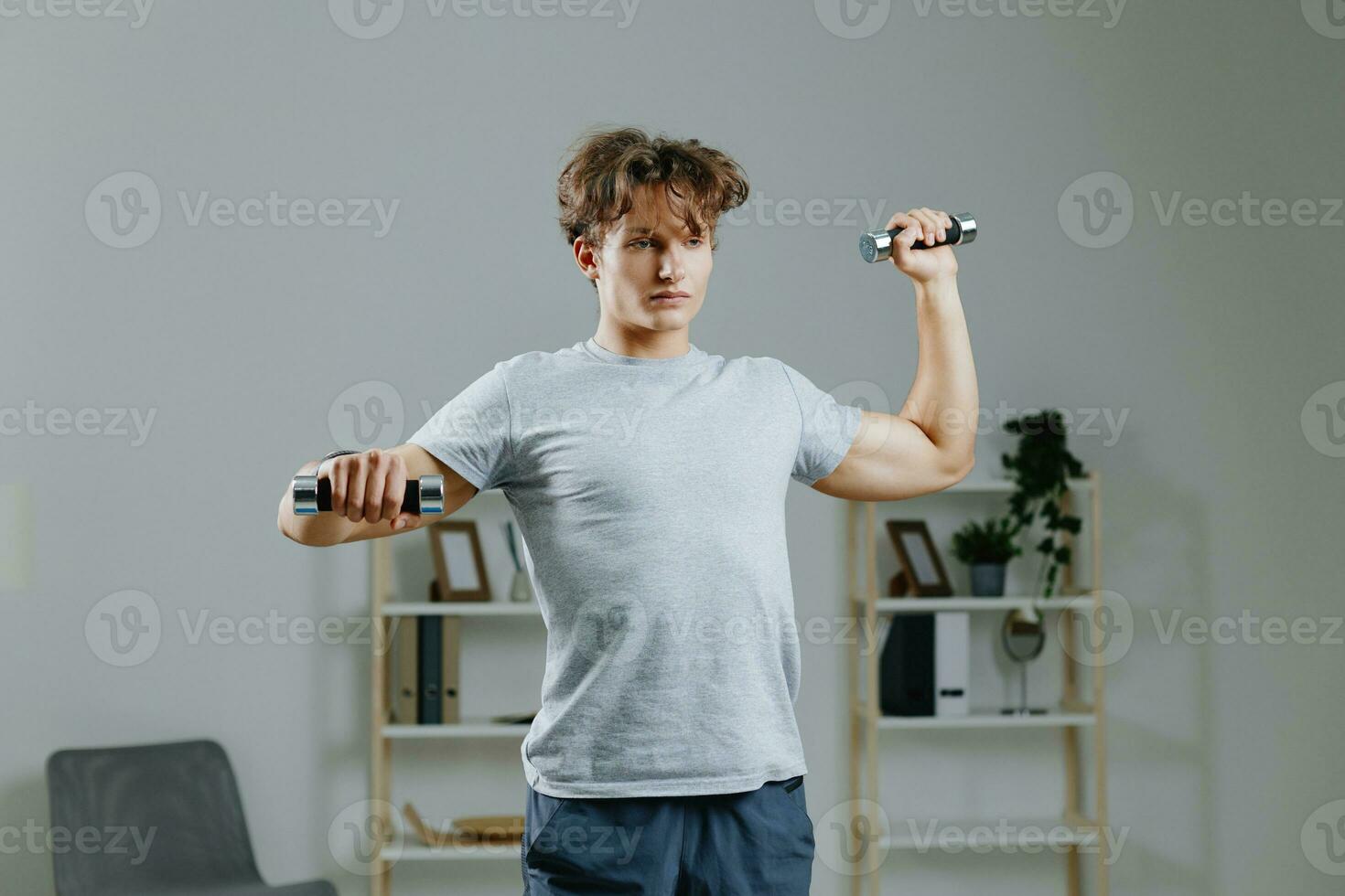 gray man health lifestyle activity exercise training indoor dumbbells home sport photo