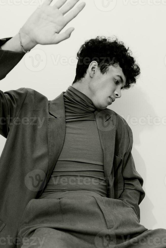 Trendy man suit pose and white background studio black fashion handsome style clothing black photo