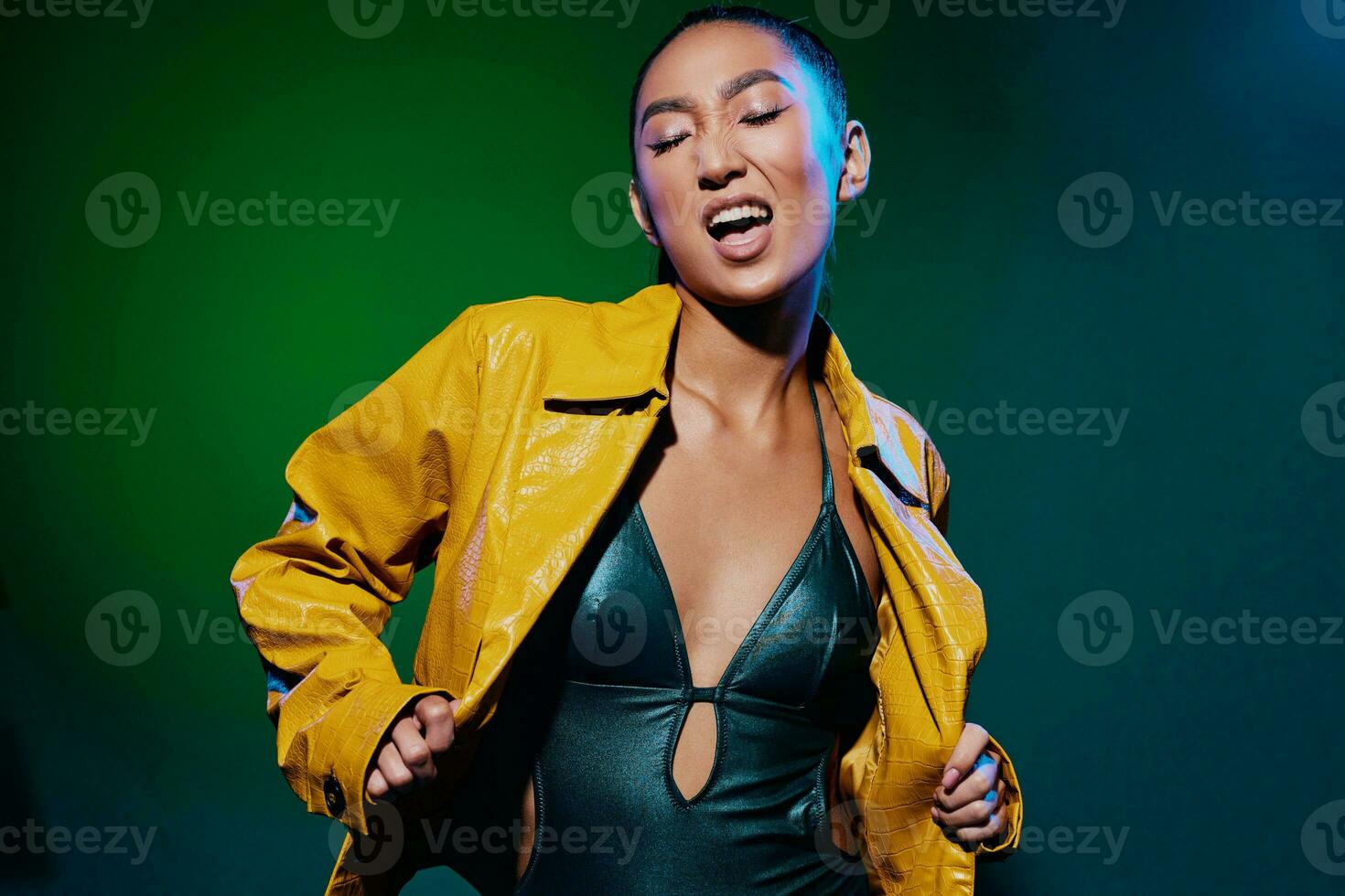 Face woman green neon disco studio light dark beauty yellow style colorful trendy fashion photo