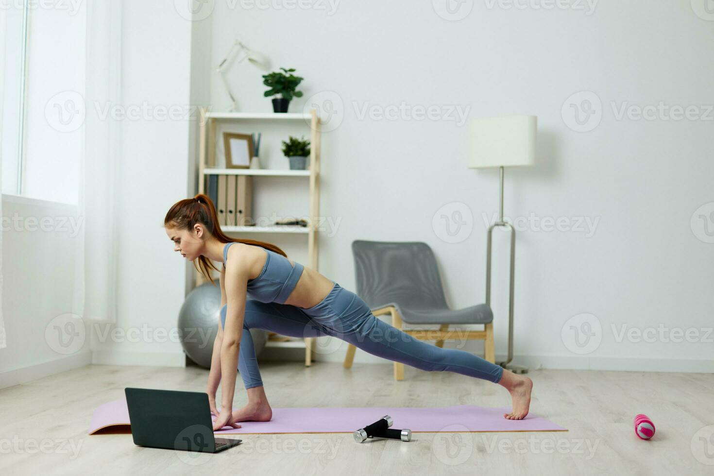 home woman health mat lotus video indoor lifestyle training yoga laptop photo