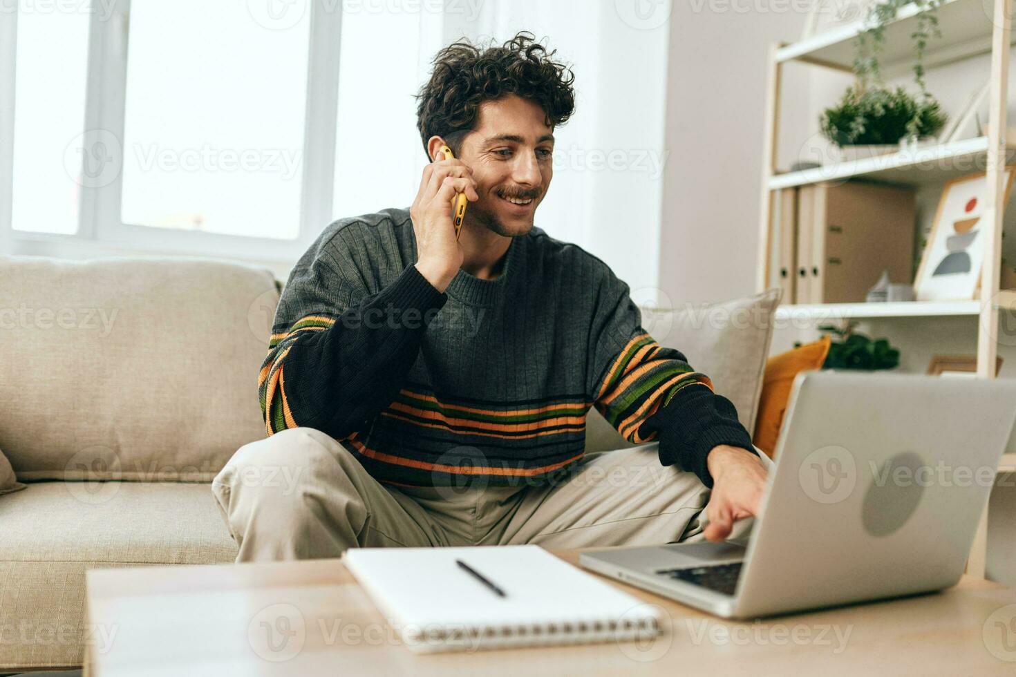 Man computer freelance business smile connection notebook working laptop home online couch photo