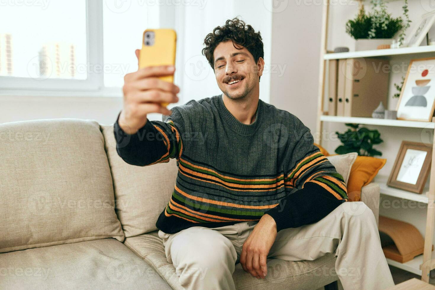 Man person message home lifestyle phone sofa computer typing technology communication selfie photo