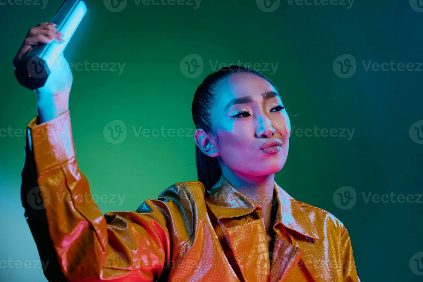 Woman beauty neon trendy colorful light disco fashion photo