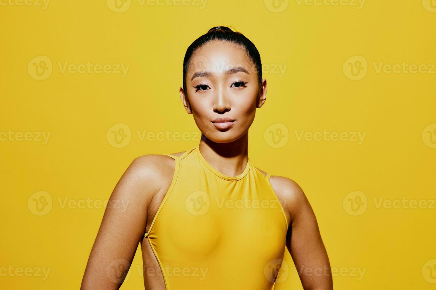 Portrait woman surprised fashion summer beauty yellow smile swimsuit makeup one trendy face photo
