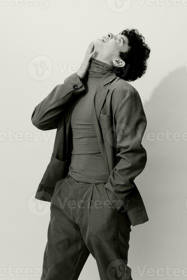 Attractive man pose black studio fashion style suit businessman white clothing and handsome trendy photo