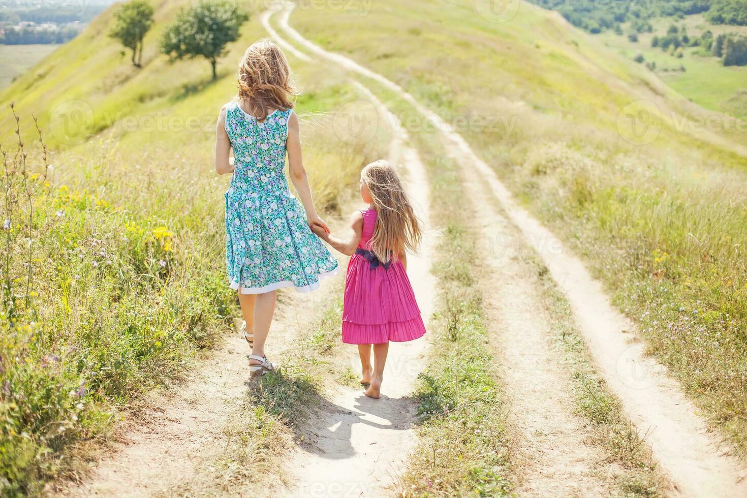 Mother and daughter in the park photo