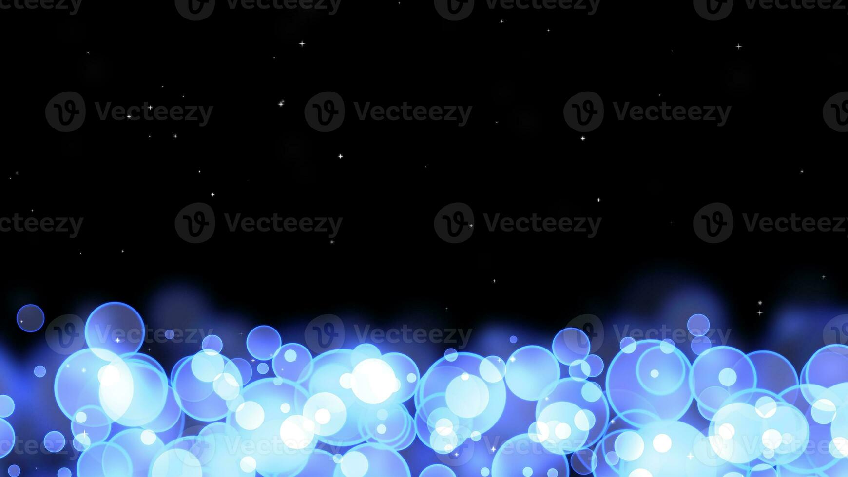 Circle bubles glow blue random size with white stars on the black isolated background photo