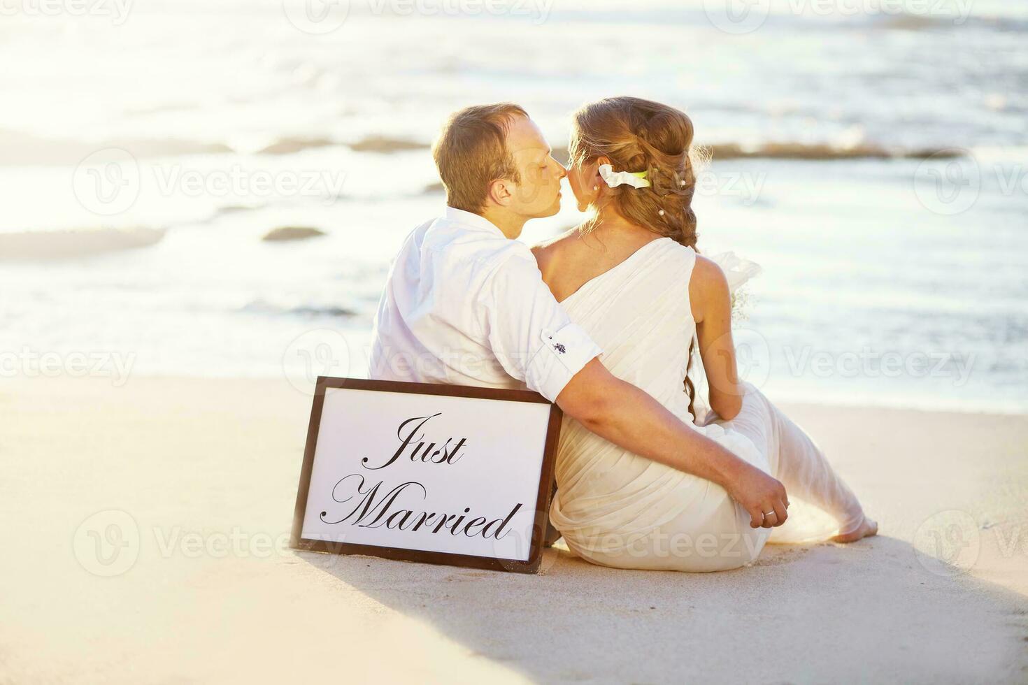 Beautiful newly married couple. Honeymoon and wedding concept photo