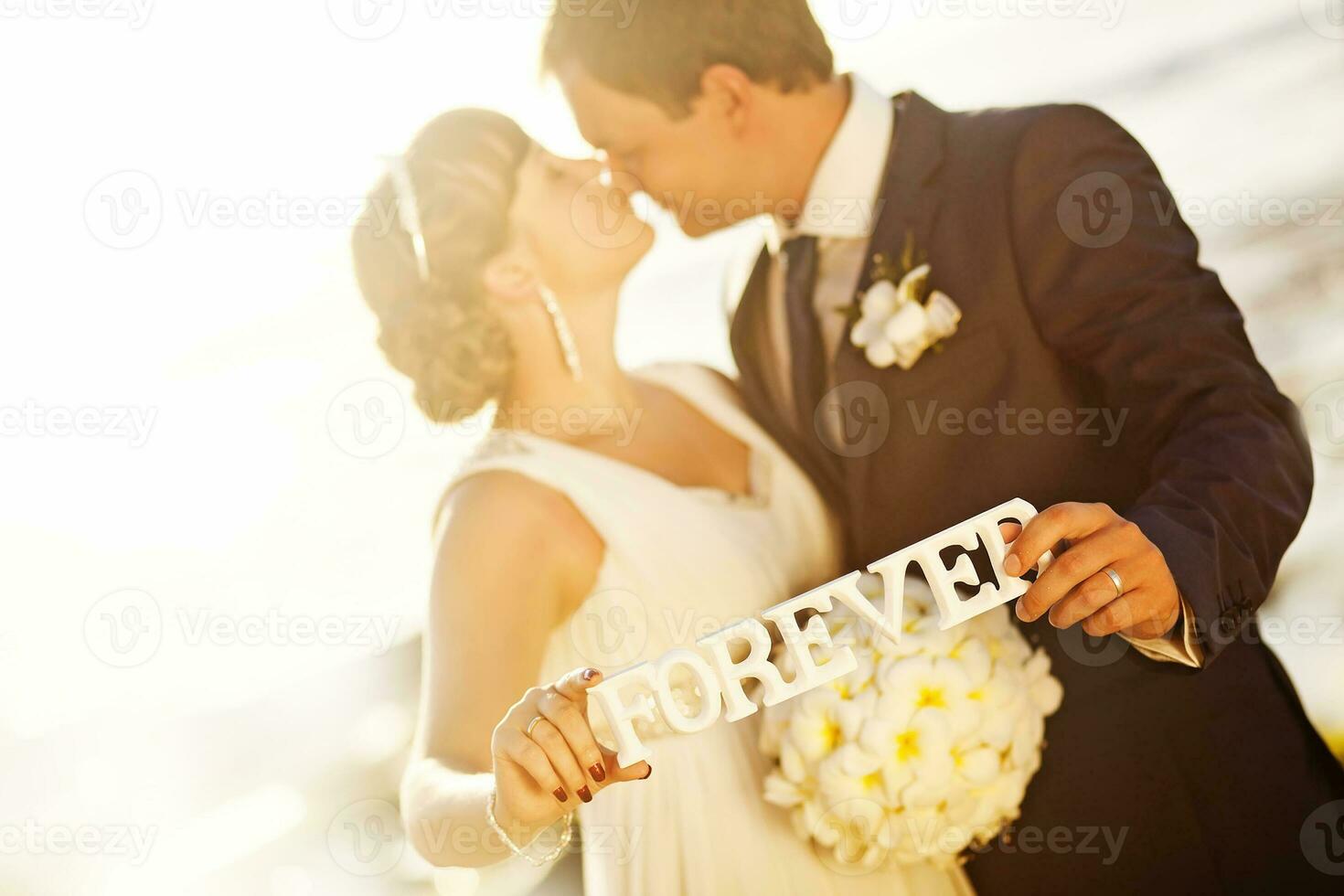Beautiful, happy newly married couple photo