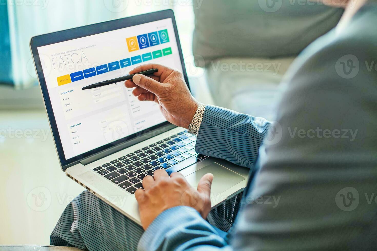man using program for FATCA photo
