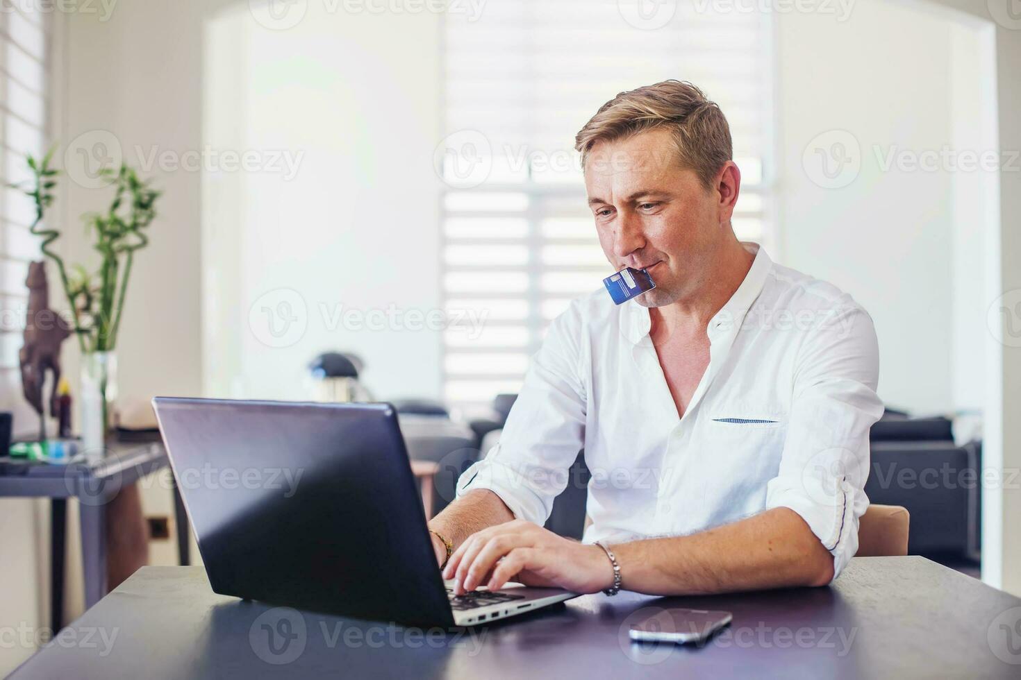 Businessman working remotely photo