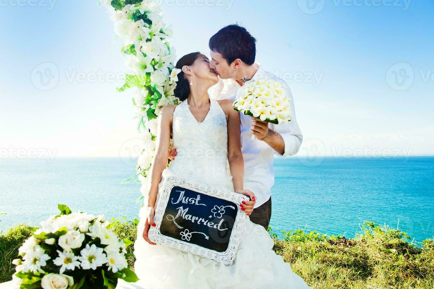 Beautiful, happy newly married couple photo