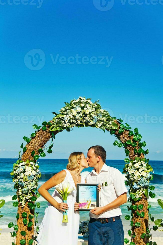 Beautiful, happy newly married couple photo