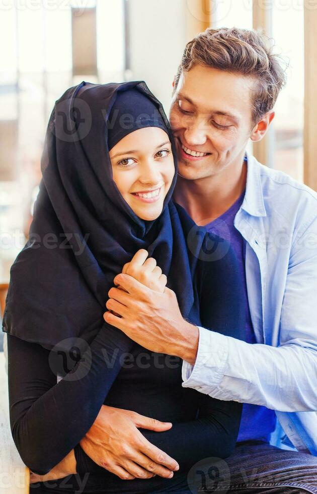 Mixed- race couple together photo