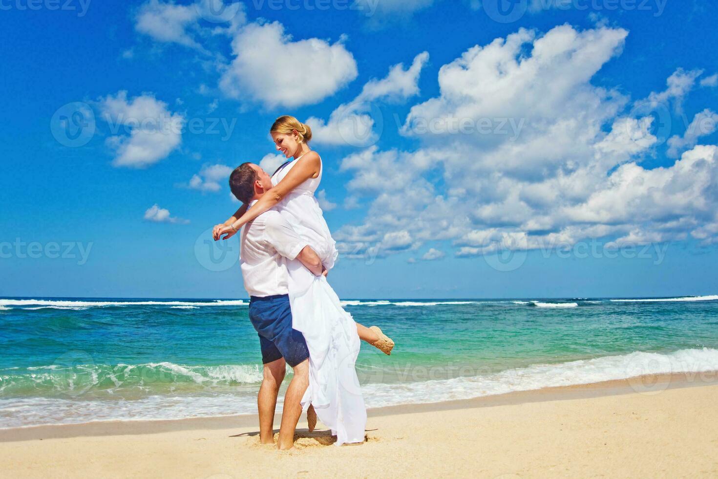 Beautiful, happy newly married couple photo