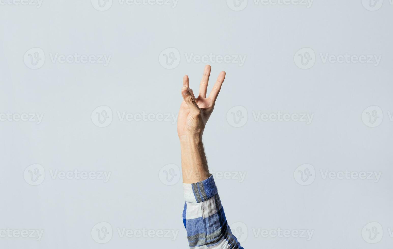 Number SEVEN in sign language. Fingers counting the number SEVEN in sign language, Fingers of people counting number SEVEN in sign language. Concept of numbers in sign language photo