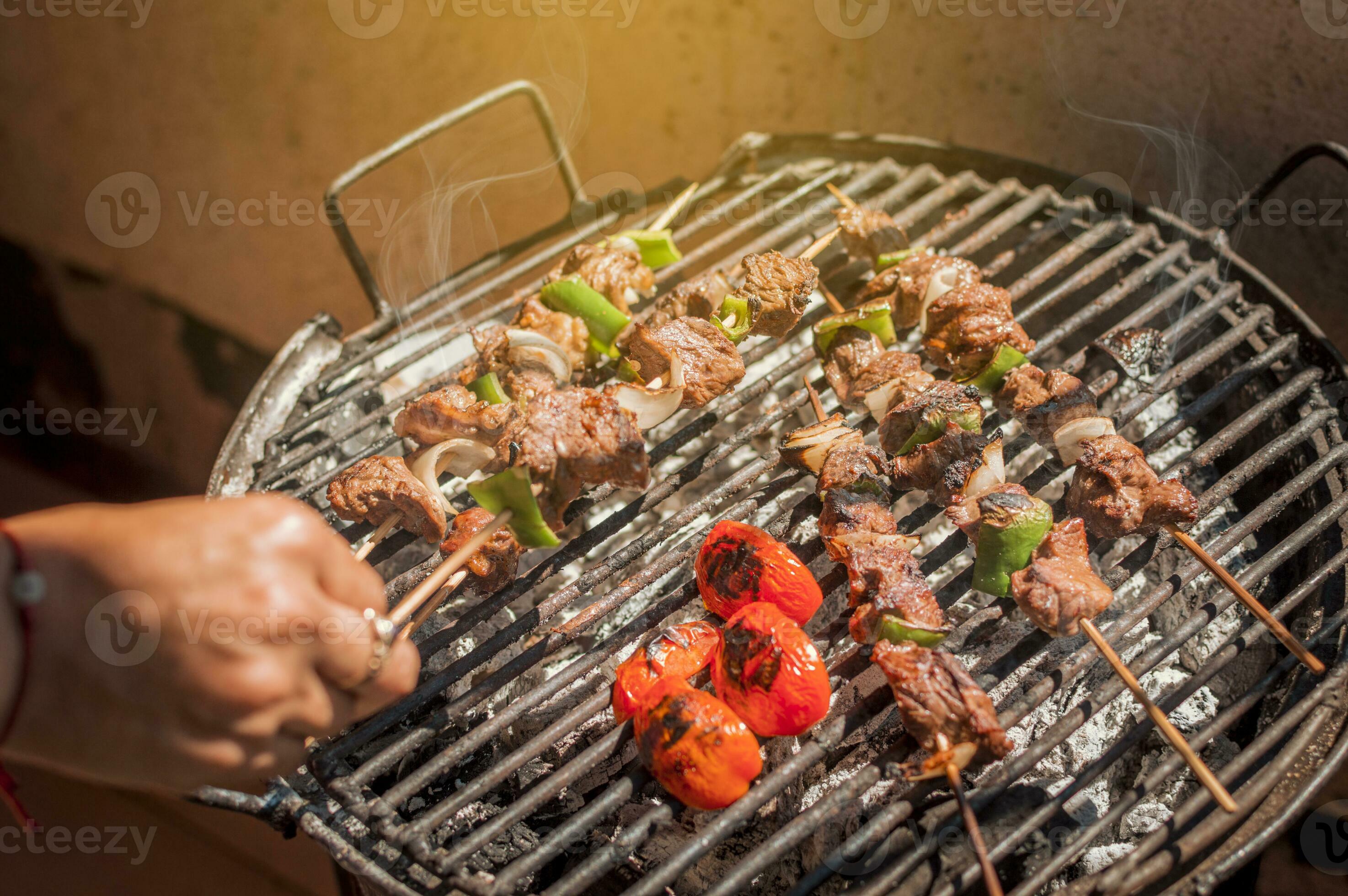 Roast beef skewers on a grill, Roast beef skewers grilling on a grill, Roast beef concept