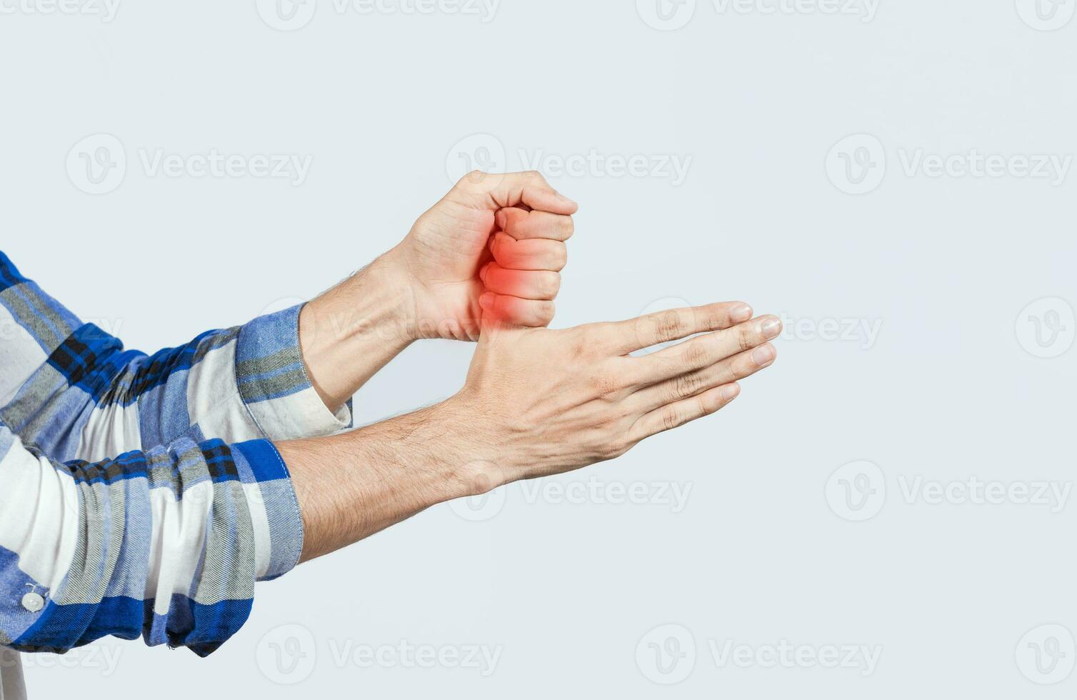 Sore fingers with arthritis isolated. Hand holding sore thumb, Close up of person hands with sore fingers, Concept of arthritis and pain in the fingers of the hand photo