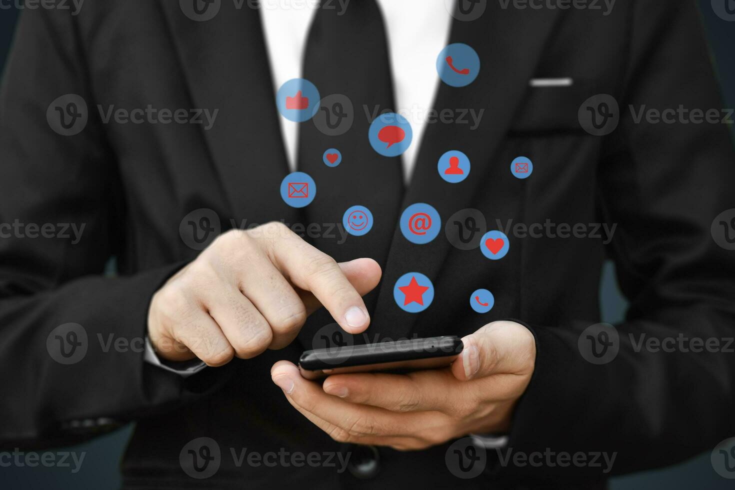 Close-up of businessman hands using mobile smartphone with social media icon. Idea for business, online marketing and technology. photo