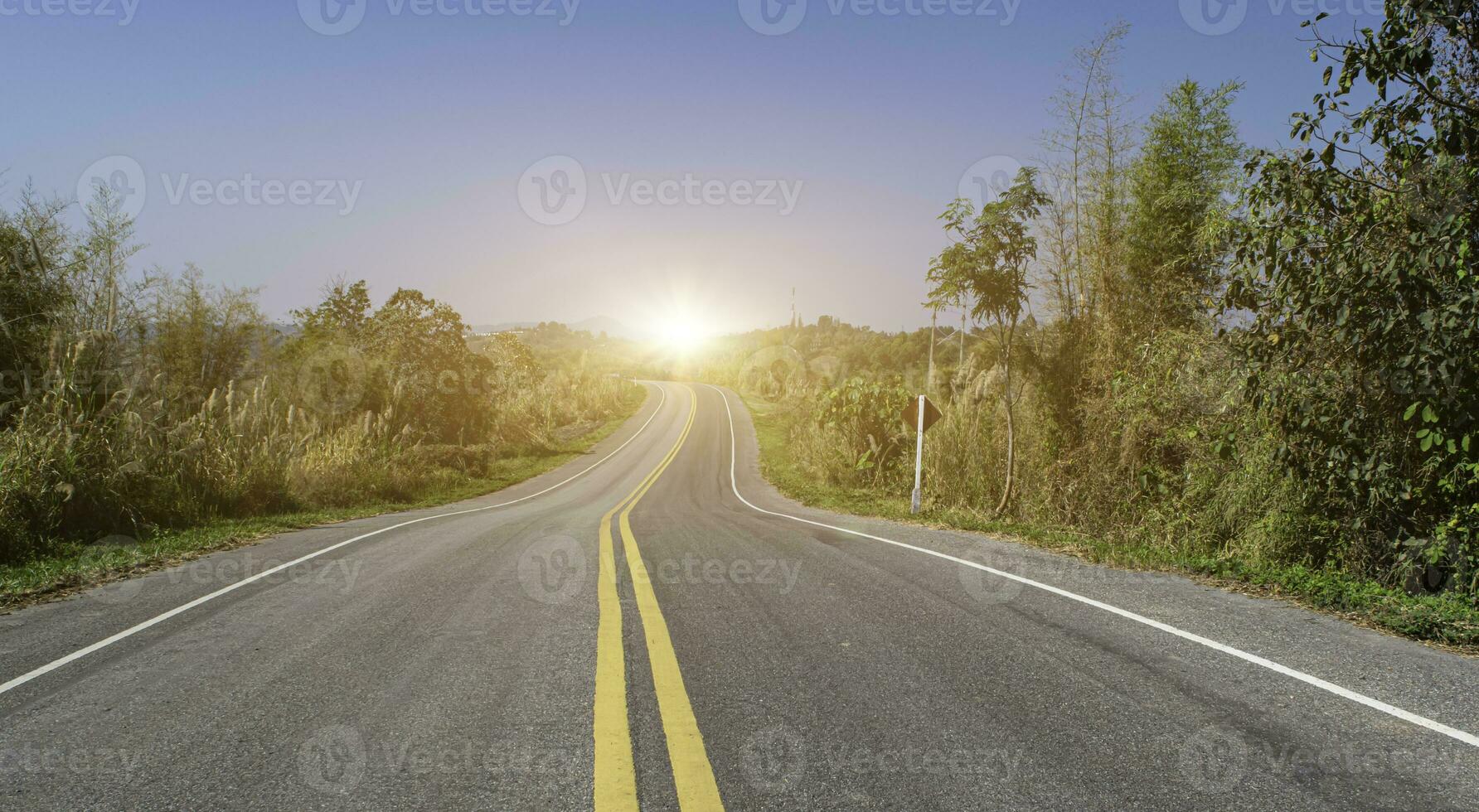 Empty asphalt road at sunrise or sunset background. Countryside landscape. photo