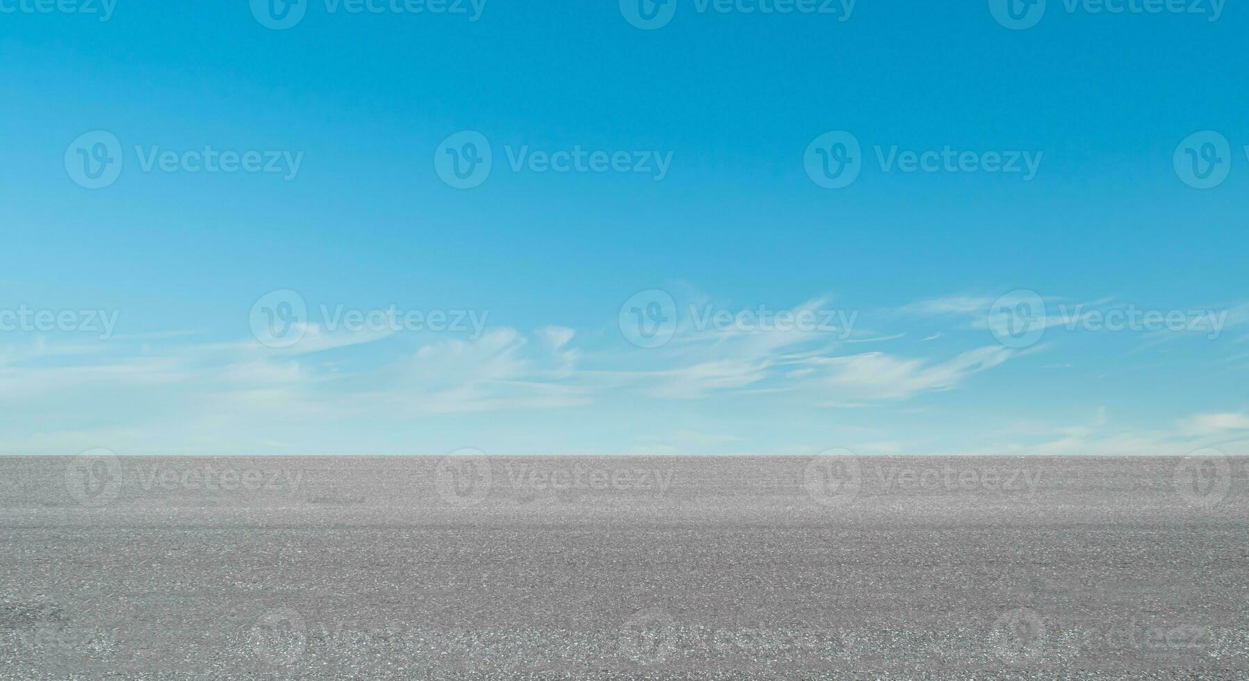 Empty asphalt road over blue sky cloud background photo