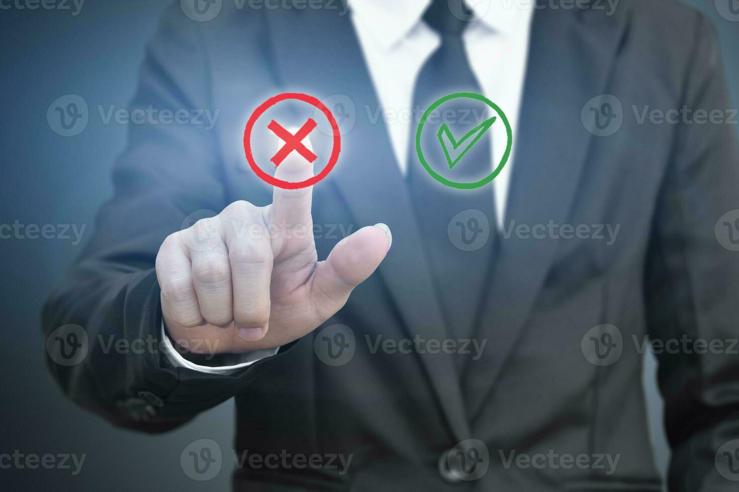 Businessman pressing touch screen right and wrong icon. Idea for about technology and choices business. photo