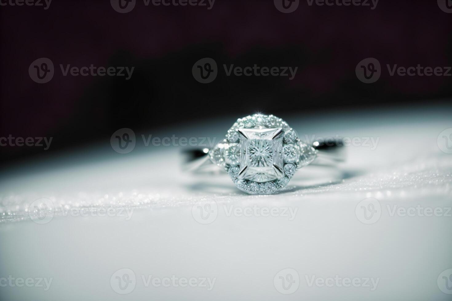 A Close Up Of A Diamond Ring On A Table. photo
