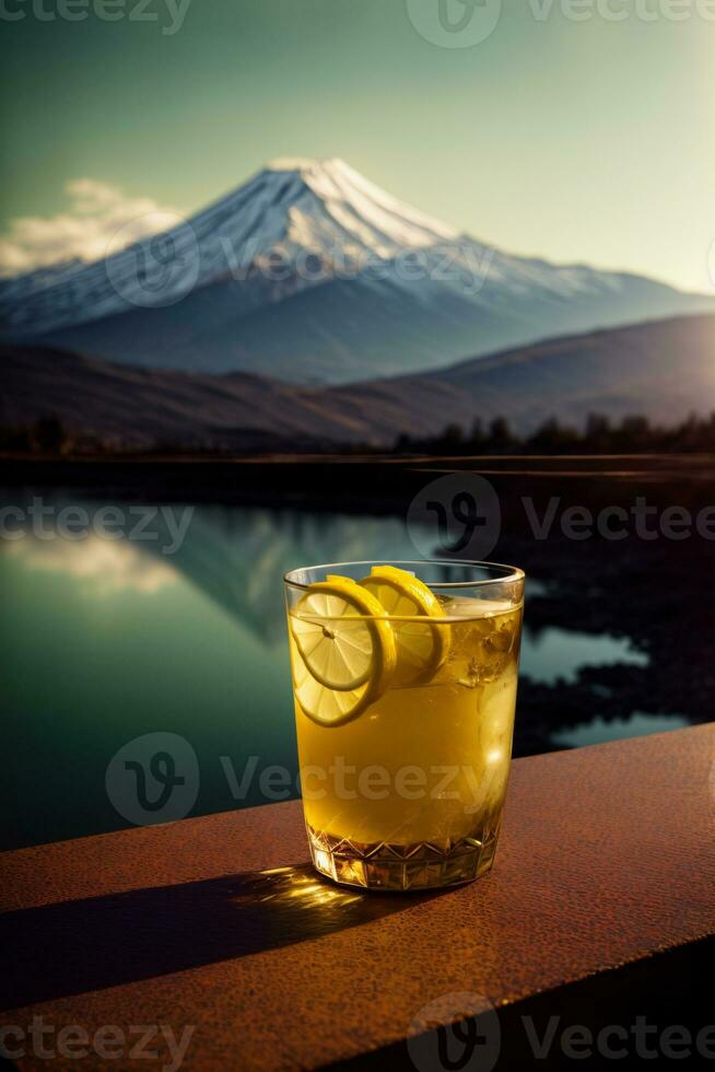 A Glass Of Lemonade With A Mountain In The Background. AI Generated photo