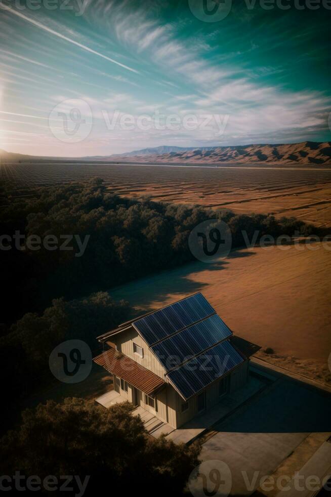 un aéreo ver de un casa con un solar panel en el techo. ai generado foto