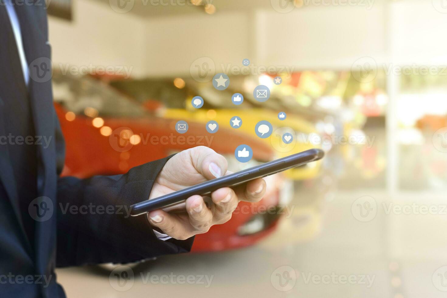 Close-up of businessman hands using mobile smartphone with social media icon. Idea for business, online marketing and technology. photo