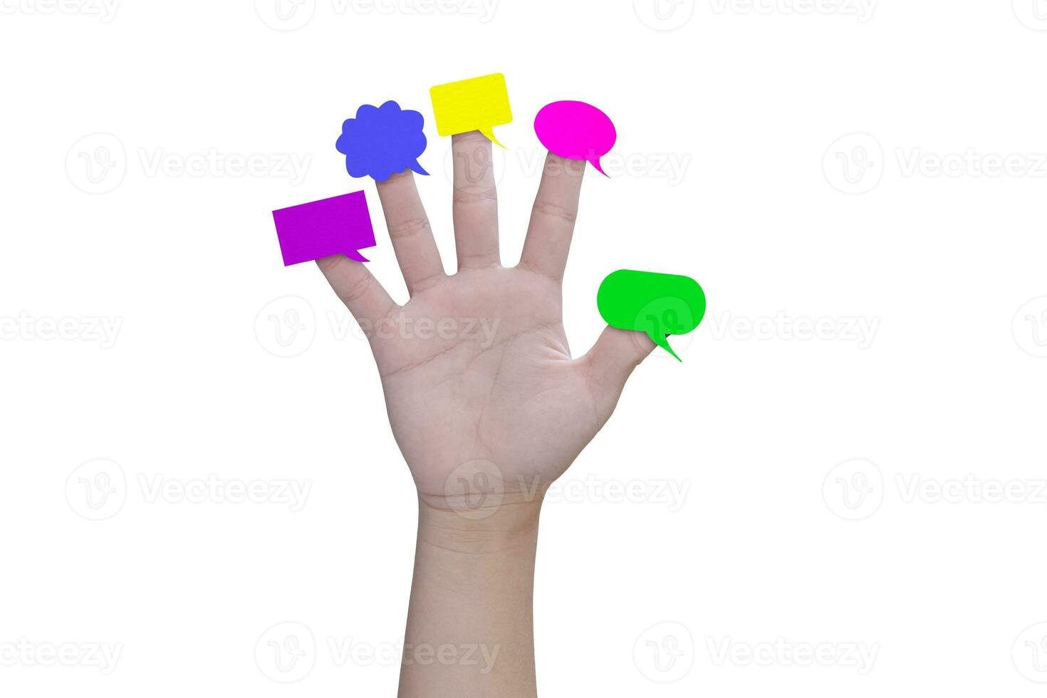 Multicolor speech bubbles on child hand fingers isolated on white background, with clipping path. photo