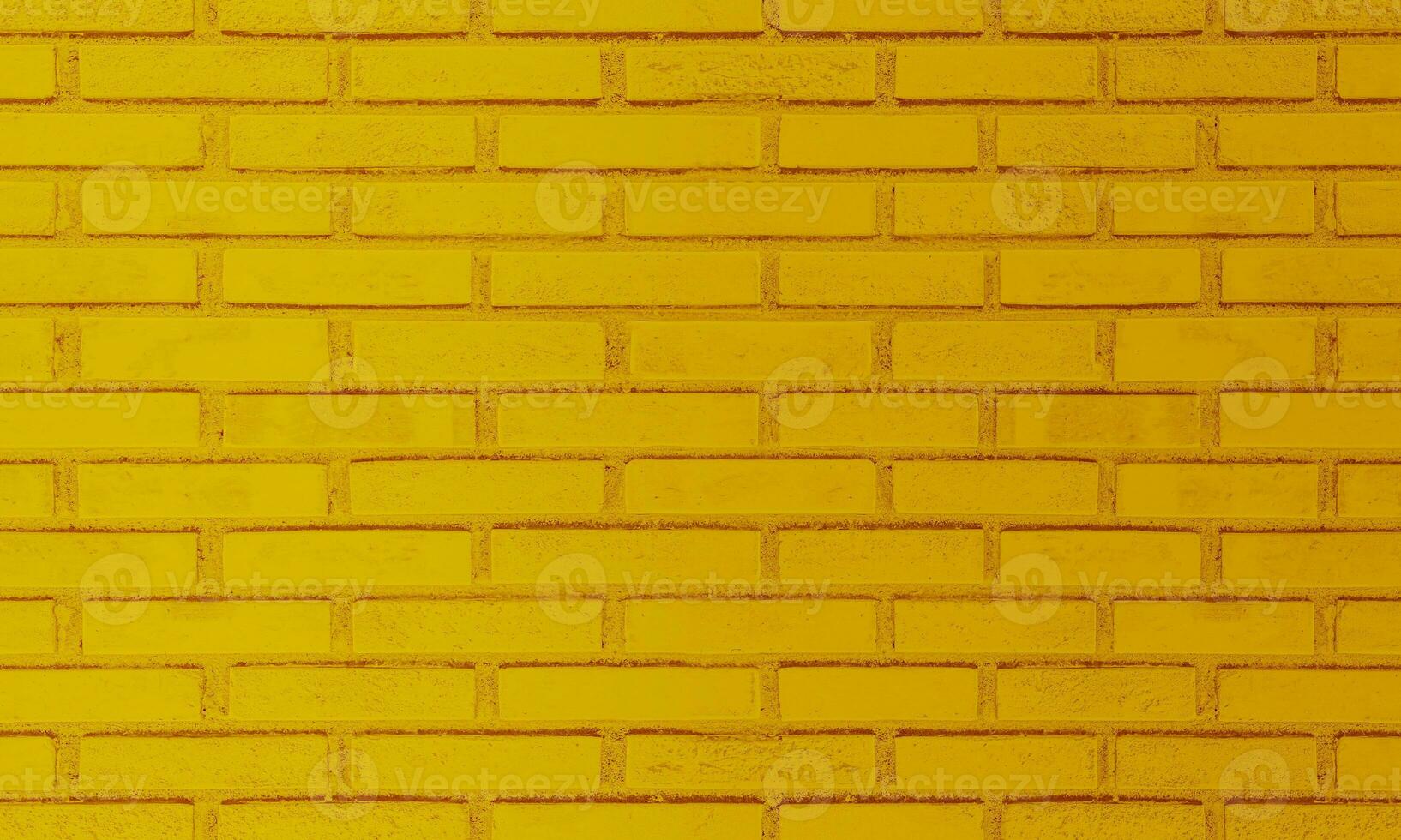 Colorful brick wall, bright yellow vintage style of brickwork background paint with texture details. photo