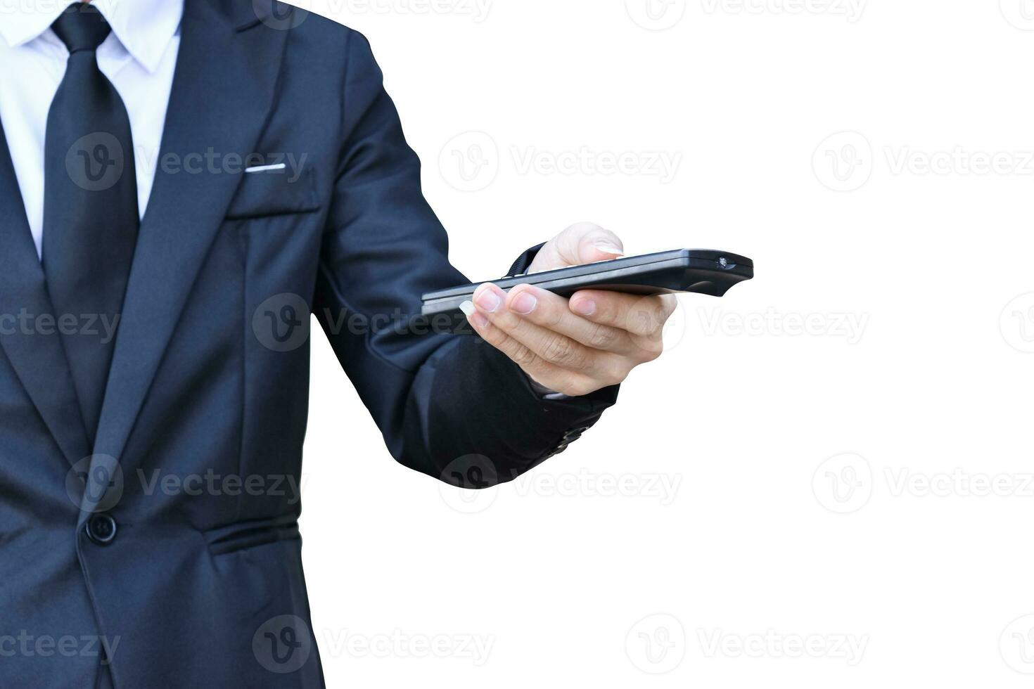 Businessman hand holding black remote control isolated on white background. with clipping path. photo